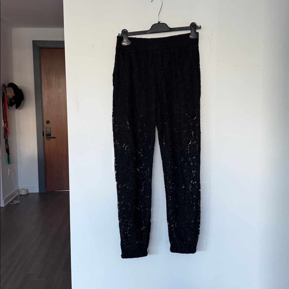 Generation Love lace Black pants. Opaque top of pant and sheer throughout leg